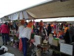 Achter de kraam
